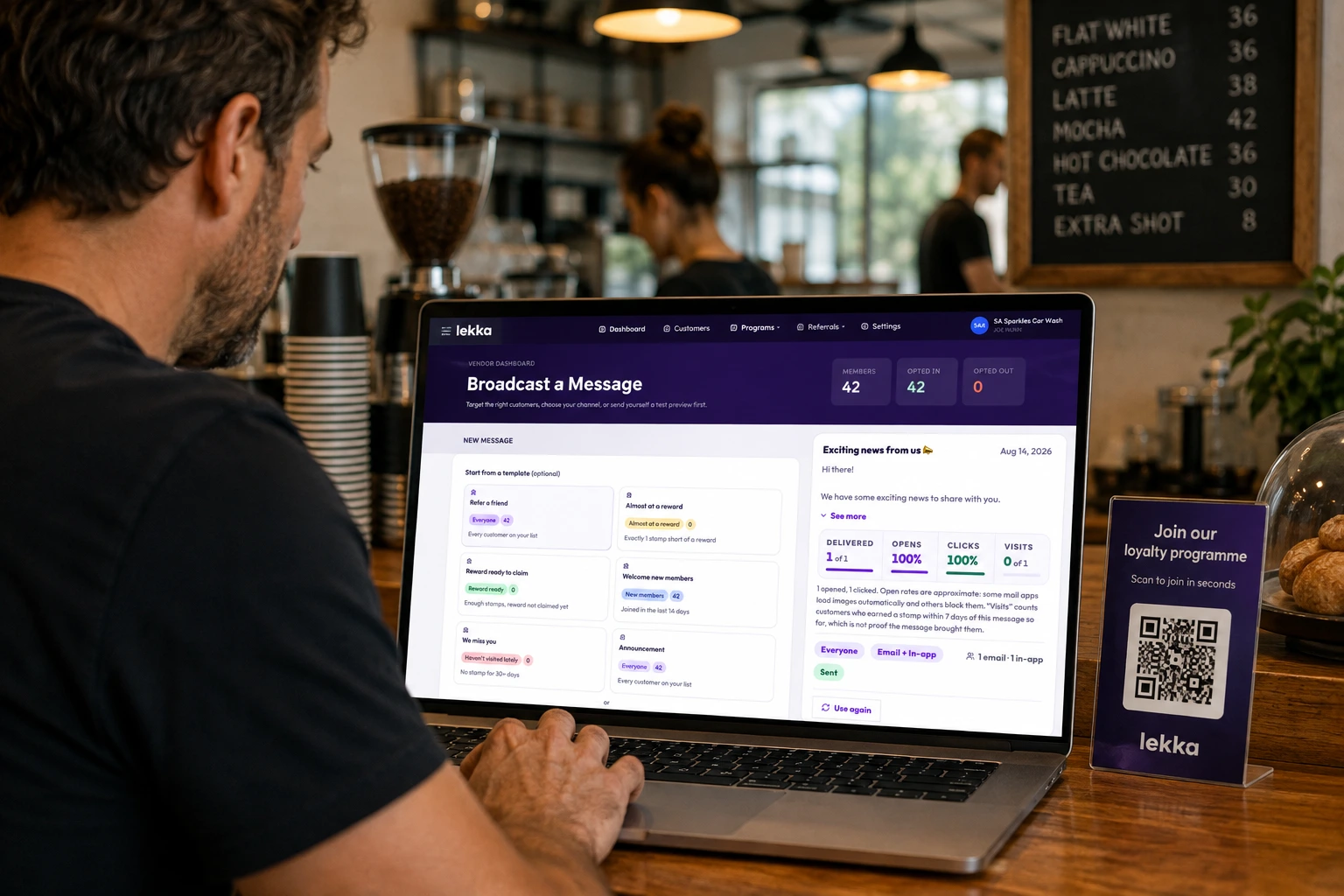 A business owner at a laptop on a cafe counter, composing a Lekka broadcast. The screen shows ready-written message templates for referrals, customers close to a reward and lapsed members, alongside a sent message reporting delivered, opens, clicks and visits.