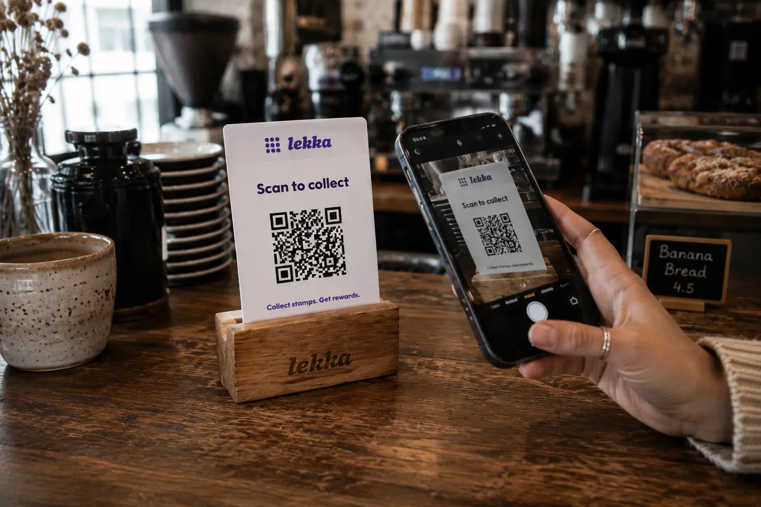 A customer scanning a Lekka QR code to collect a stamp